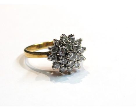 An 18ct gold diamond cluster ring, size M, 4.1g
