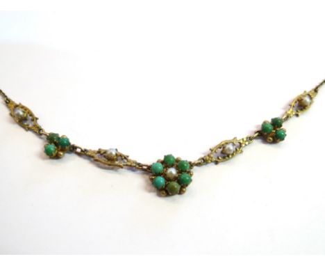 A turquoise and seed pearl necklace floral central pendant, clasp stamped 9ct, 7.9g