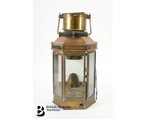 A brass Maritime Bulpitt &amp; Sons Ships Cabin Oil Lamp, embossed to the chimney front: Bulpitt &amp; Sons Ltd, dated 1942, 