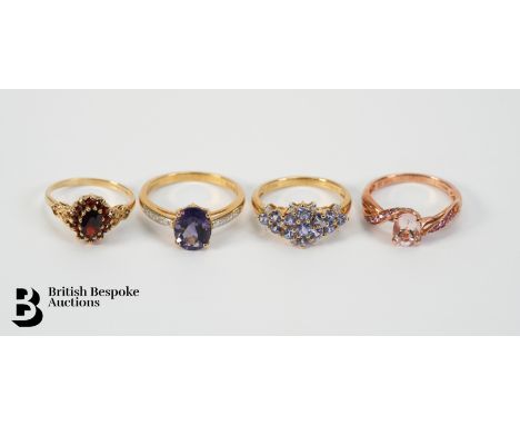 A 9ct gold ring set with six 4mm garnets and 12 x 1.5 garnets, size L 1.82 gms, the second is hallmarked 9ct set with a 7 x 5