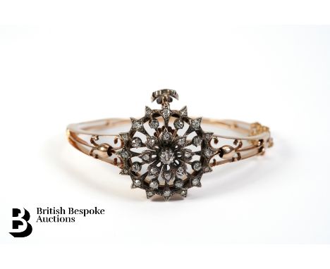 Late Victorian 14ct gold, silver and diamond floral pendant/bracelet. The removable floral section measures 28 mm diameter se