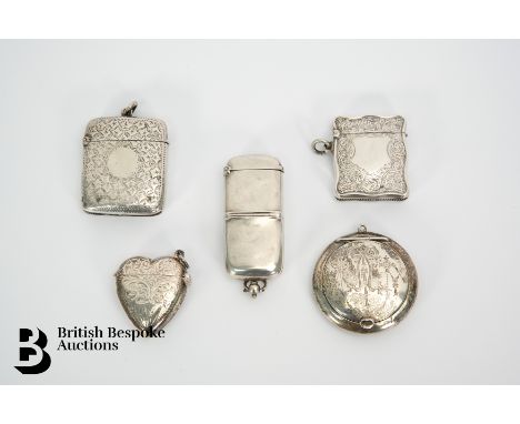 Four silver vesta cases, the first is Birmingham hallmark dated 1897, mm HP; the second is Birmingham hallmark dated 1903, mm