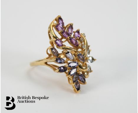 9ct gold ring set with five 4.5 x 3.2mm aquamarines and seven 4.5 x 3.2mm amethysts and ten 4.5 x 3.2mm iolites and approx 2 