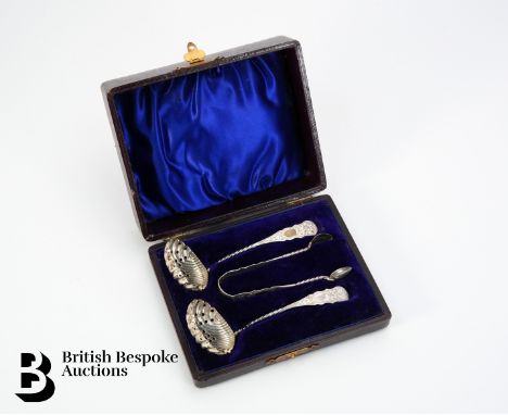Two silver caster spoons and sugar nips Birmingham hallmark dated 1908, mm W.D, approx 102 gms.&nbsp;