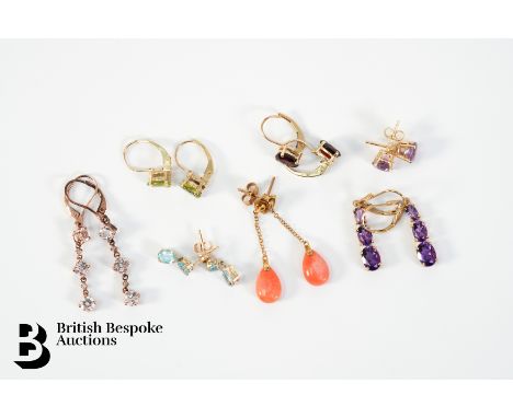 Seven pairs of 9ct and semi-precious stone earrings, gross weight 10.5 gms. The first pair is 9ct with two coral drops 11 x 7