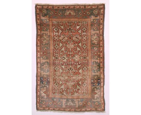 Smyrna carpet, Lotto design. Anatolia. Early 20th century. Various small replenishment spots on the field. 176x118 cm approx.