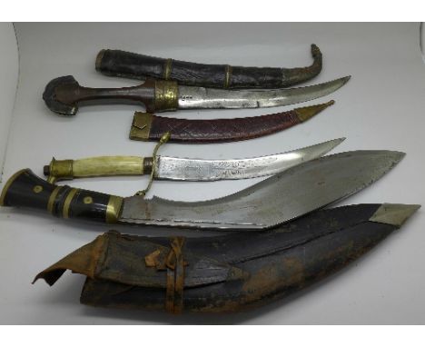 A Kukri, a Jambiya dagger and one other dagger with ivory handle