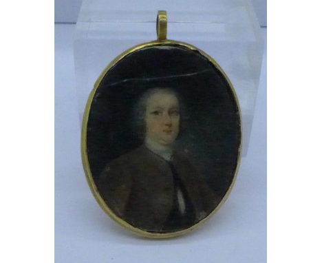 A Georgian miniature portrait pendant set in yellow metal, a/f, 40mm x 33mm