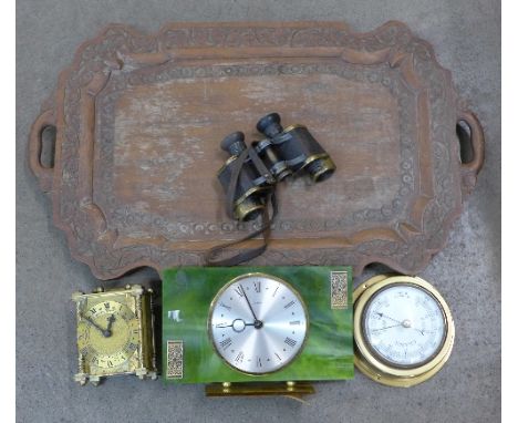A Smiths brass clock, a barometer, a Bentima mantel clock lacking glass, a pair of field glasses and a carved wooden tray