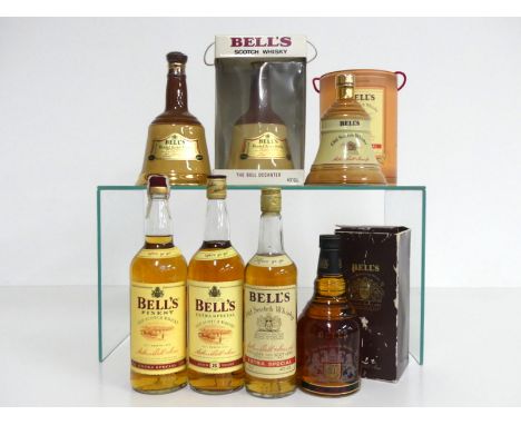 2 75-cl bts Bells Specially Selected Blended Scotch Whisky Wade Decanters 40%, 1 oc 1 75-cl bt Bells Extra Special Blended Sc