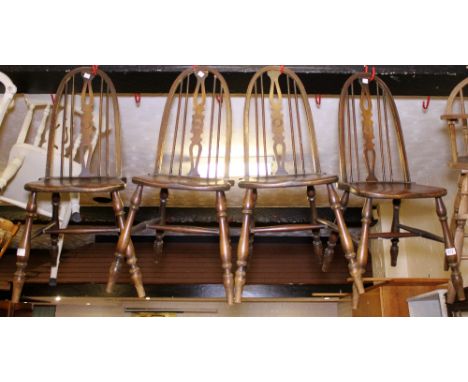 ELM CHAIRS. Four Ercol? elm seated dining chairs