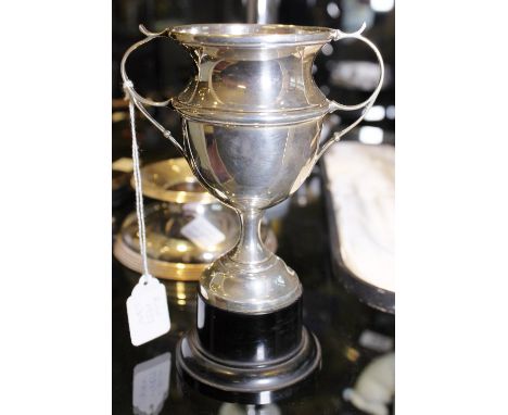 SILVER TROPHY. Hallmarked silver unattributed twin handled trophy on black plinth, Birmingham 1939, H ~ 17cm