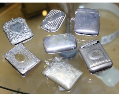 VESTA CASES. Seven silver and white metal vesta cases