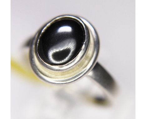 STERLING SILVER RING. Sterling silver haematite solitaire ring, size U/V