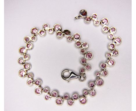 SILVER BRACELET. Sterling silver pink stone set bracelet