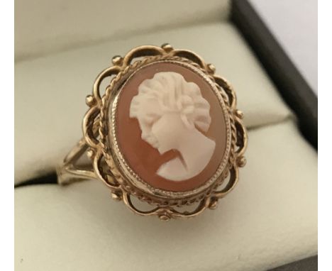 A 9ct gold ladies classic cameo ring in decorative mount. Size O½. Selling on behalf of Hillside Animal Sanctuary. Total weig