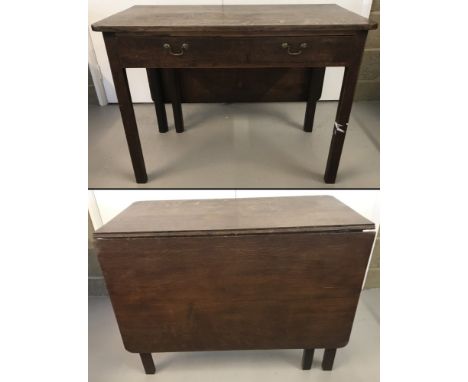 A Georgian dark oak one sided drop leaf gate leg table. Central draw with drop down brass handles. Approx. 72cm tall x 99cm w