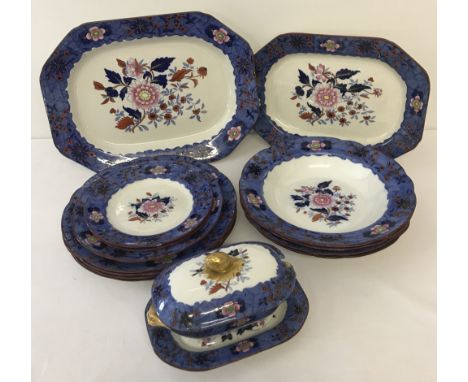 A quantity of early 19th Century Copeland Spode dinner ware of floral design with Royal Blue border and red rim. Comprising: 