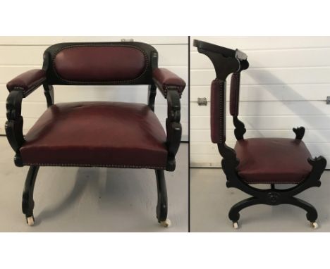 A late Victorian "Prie Dieu" chair with red leather and studded upholstery and ceramic castors.  Approx. 65cm tall
