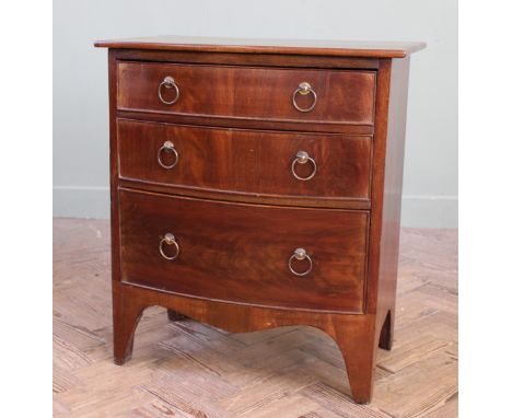 A late 19th Century converted bow front commode chest