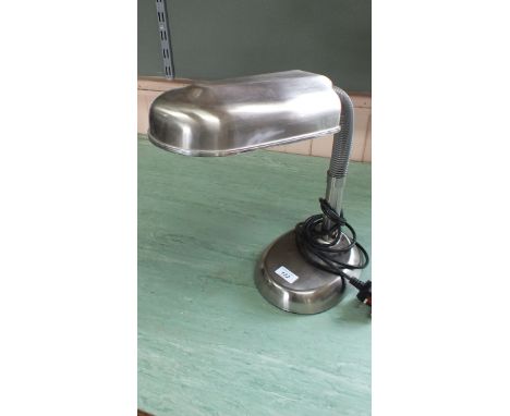 A late 20th Century brushed steel desk lamp