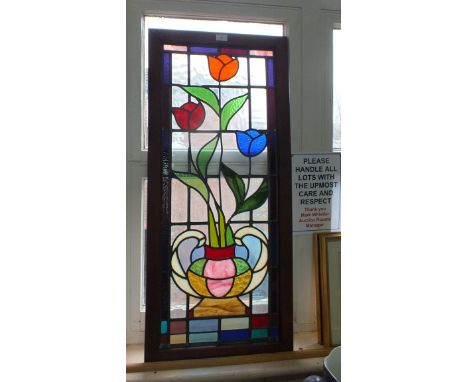 An Art Nouveau stained glass lead light, 15 1/4" x 39"