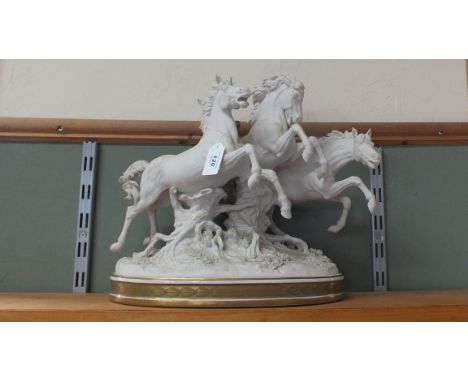 A white ceramic 'Algora' leaping horses figurine, 14" high approx (some damage)