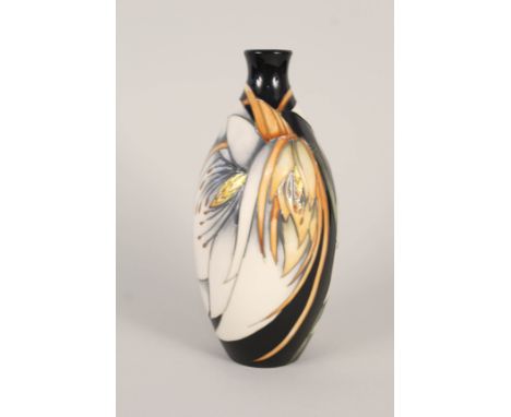 A boxed Moorcroft vase, Philip Gibson, height 9"