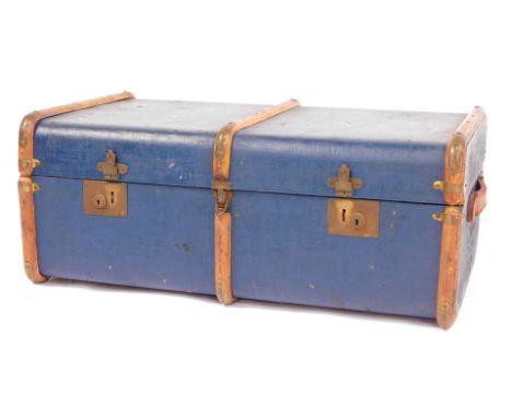 A vintage canvas cabin trunk, brass and bentwood bound with leather handles, 82cm x 50cm x 33cm. 