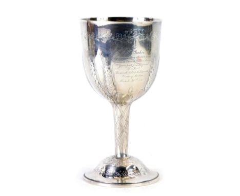 A Victorian silver goblet, with engine engraved floral vine decoration and wheat sheaf moulding, inscribed to J P Baker March