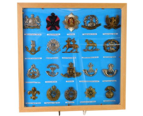 A group of military cap badges, to include King's Royal Rifle Corps, Manchester regiment, East Lancashire regiment, Somerset 