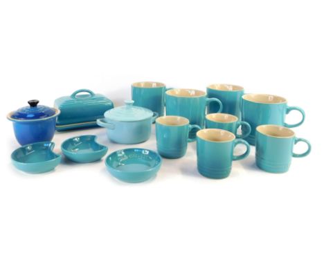 A group of Le Creuset homewares, comprising a set of four 0.35 litre light blue mugs, four 0.1 litre espresso mugs in pale bl