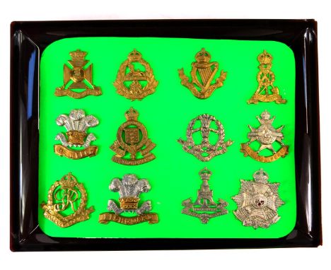 A group of military cap badges, to include Royal Army Ordnance Corps, Military Policemen, Fishguard, Nottinghamshire and Derb