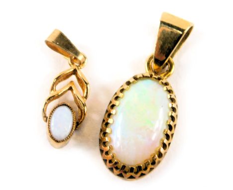 Two opal pendants, comprising a 9ct gold and opal crossover pendant, 1.5cm high, and an opal and yellow metal mounted oval pe