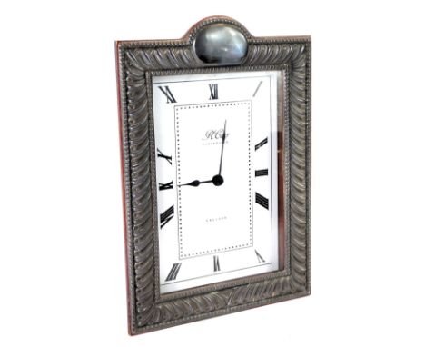 An Elizabeth II silver framed mantel clock, by R Carr, rectangular dial bearing Roman numerals, battery operated quartz movem