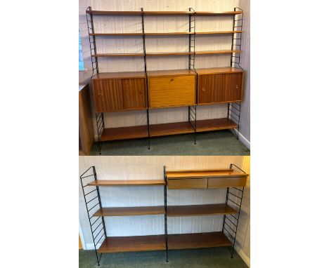 A 1970s Ladderax type wall unit, incorporating three cupboards and with adjustable open shelves, and a two drawer shelf unit.