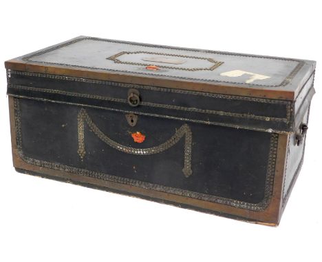 A 19thC leather and brass bound trunk, camphor wood interior, with brass plaque to top for E Lancaster, with stud work and pa