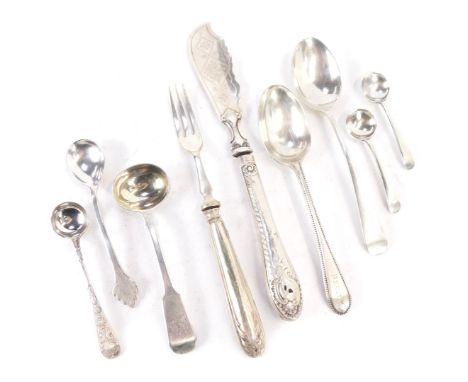 A group of silver and white metal cutlery, comprising Victorian silver fiddle pattern toddy ladle, two silver preserve spoons
