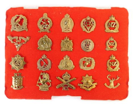 A group of New Zealand related military cap badges, to include 4th Otago regiment, 10th North Otaco Rifles, New Zealand Army 