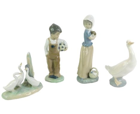 Four Nao porcelain figures, comprising a girl with a puppy, boy with a football, a duck, and three ducklings. 