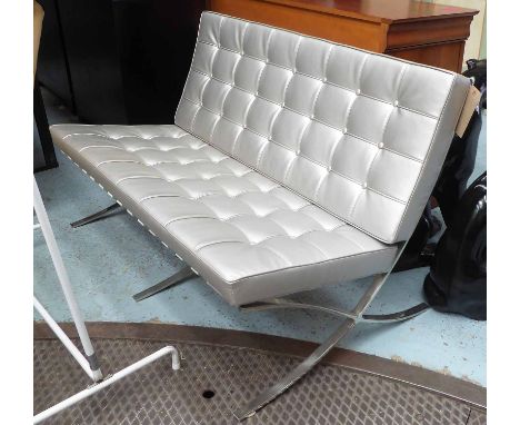 SOFA, two seater, Barcelona inspired after Ludwig Mies van der Rohe, in silver colour on chromed metal supports.