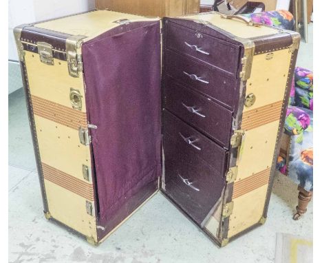 TRAVEL TRUNK WARDROBE, mid 20th century American canvas, leather and brass bound, bears plaque 'The Royal robe trunk, Petersb
