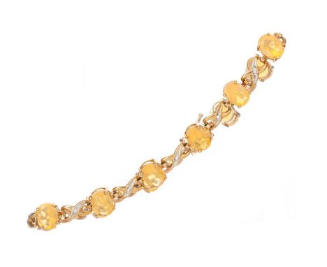 FIRE OPAL BRACELET set with oval stones interspaces with 'X' links, each set with a small diamond, marked 37519.5cm longOpals