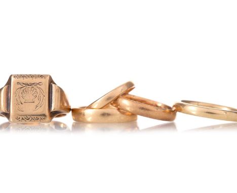 FOUR GOLD WEDDING BANDS  ALONG WITH A SIGNET RING the wedding bands in eighteen carat gold, 10.9g gross, along with a nine ca