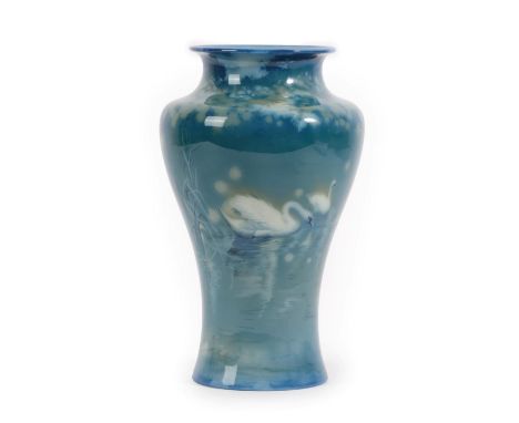 A Royal Worcester Sabrina Ware Vase, by James Southall, painted with swans on a blue ground, printed factory marks and date c