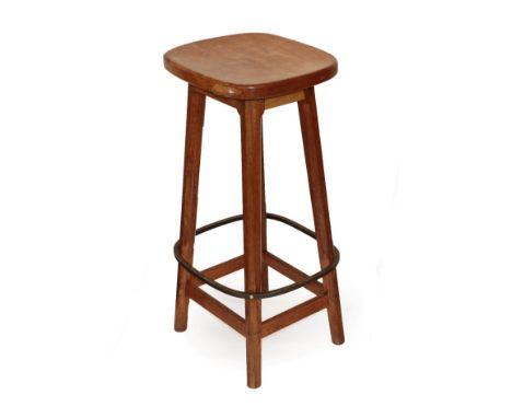 Workshop of Robert Mouseman Thompson (Kilburn): An English Oak Bar Stool, circa 1970s, shaped adzed top, on four octagonal le