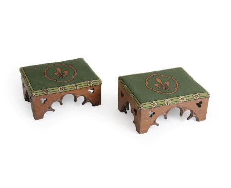 A Pair of Gothic Revival Oak Church Kneelers, with tapestry tops and pierced tracery side panels, 52.5cm by 37cm, 29cm  From 