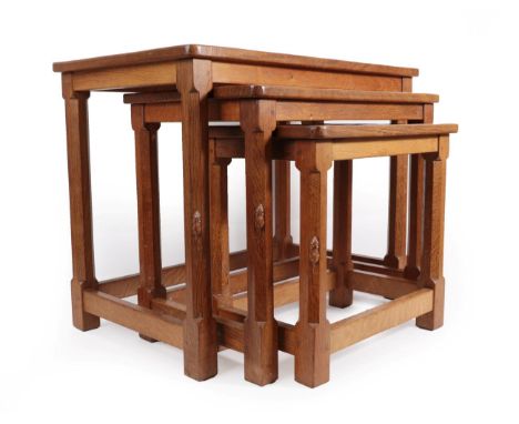 Workshop of Robert Mouseman Thompson (Kilburn): An English Oak Nest of Three Tables, post 1960, adzed rectangular tops, on fo