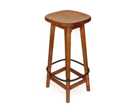 Workshop of Robert Mouseman Thompson (Kilburn): An English Oak Bar Stool, circa 1970s, shaped adzed top, on four octagonal le