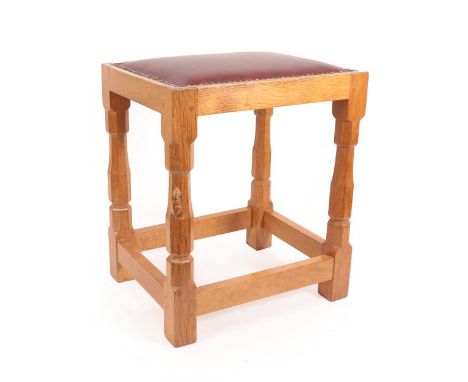 Workshop of Robert Mouseman Thompson (Kilburn): An English Oak Dressing Table Stool, post 1960, upholstered mulberry hide sea